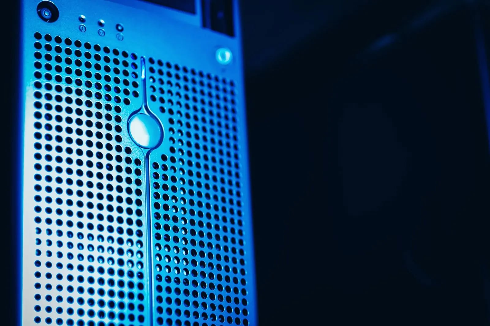 Representational image: modern server racks with blue lighting in a secure data center, symbolizing database schema migrations